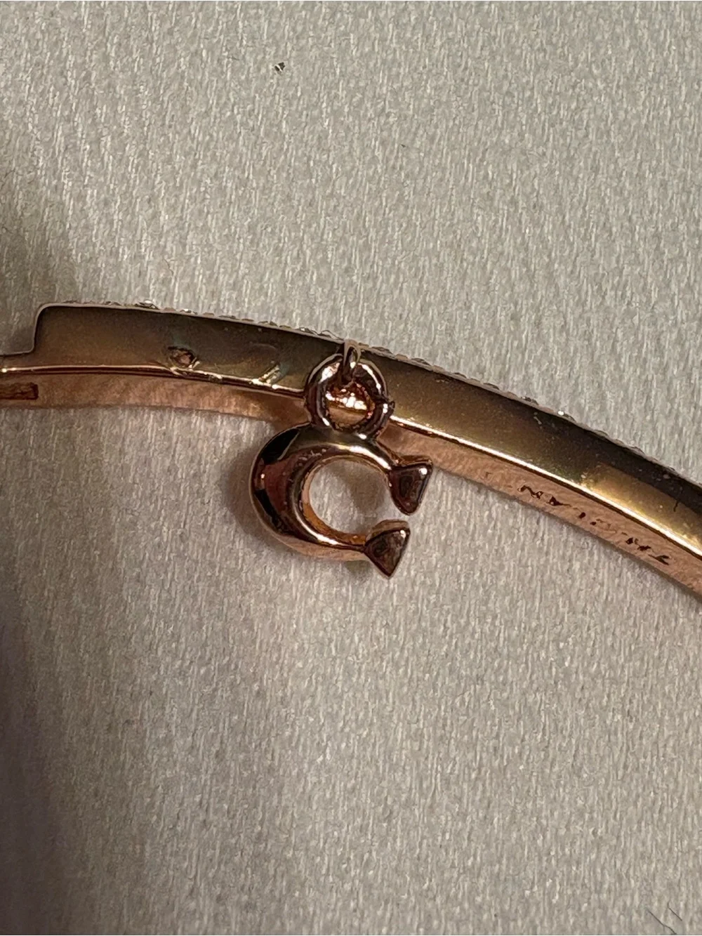 Coach Rose Gold Crystal Pavé Hinged Bangle with 'C' Charm